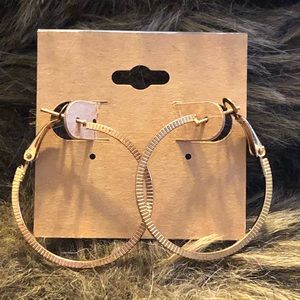 Gold plated textured omega back hoop earrings